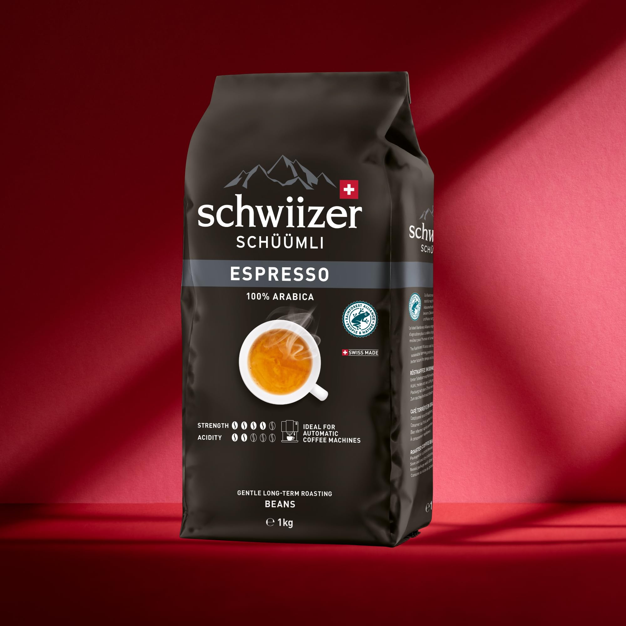 Schwiizer Schüümli Espresso, 100% Arabica Kaffeebohnen, kräftig-intensiv, ideal für Vollautomaten, Stärke 4/5, mittlere Röstung, Rainforest Alliance, 1kg