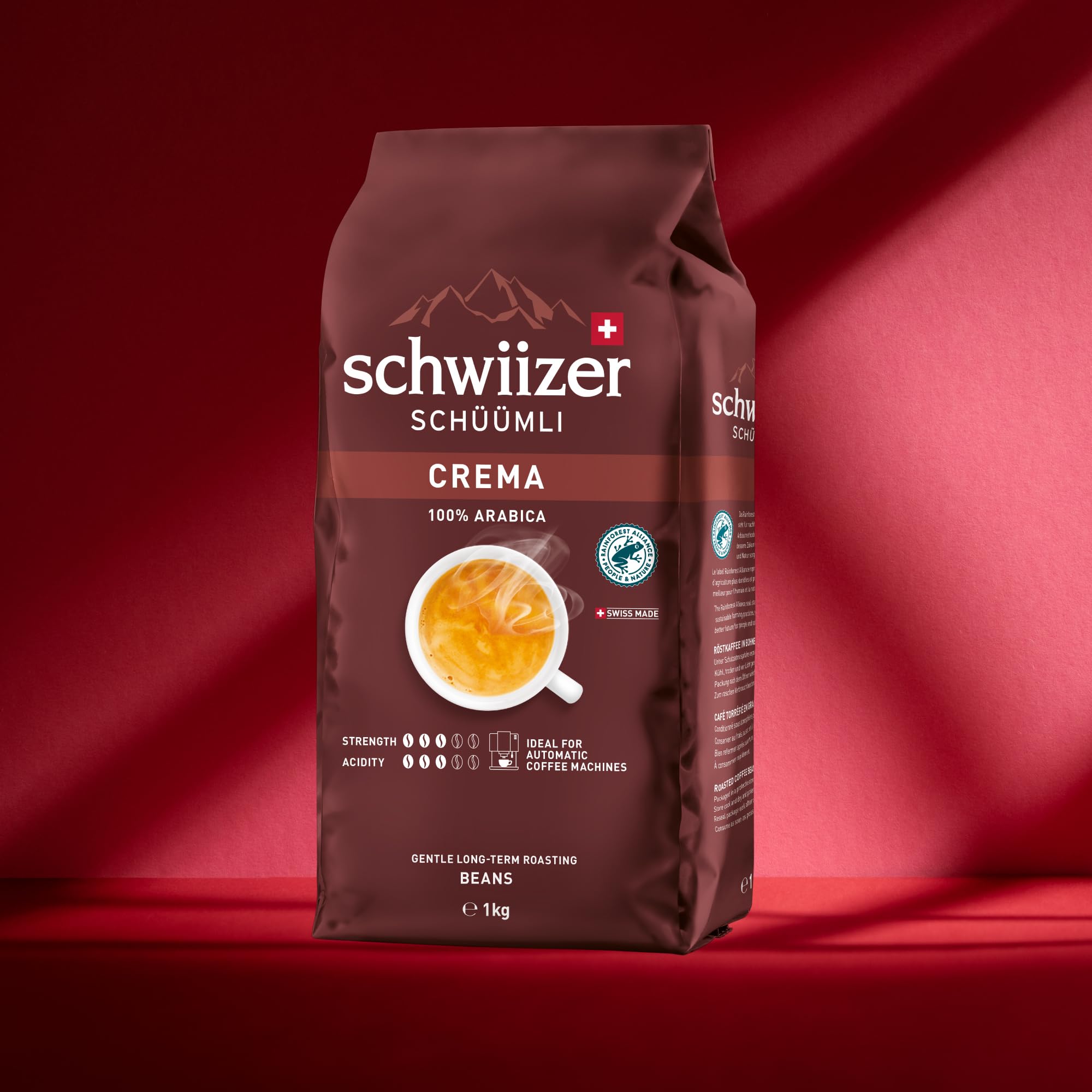 Schwiizer Schüümli Espresso, 100% Arabica Kaffeebohnen, kräftig-intensiv, ideal für Vollautomaten, Stärke 4/5, mittlere Röstung, Rainforest Alliance, 1kg