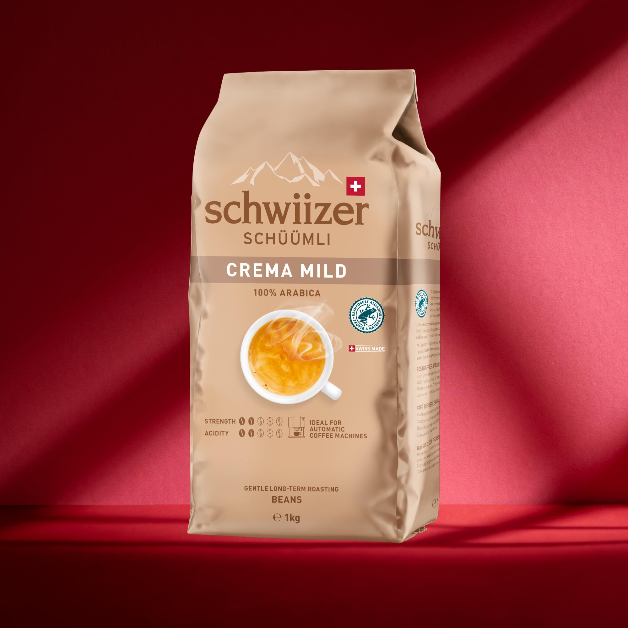 Schwiizer Schüümli Espresso, 100% Arabica Kaffeebohnen, kräftig-intensiv, ideal für Vollautomaten, Stärke 4/5, mittlere Röstung, Rainforest Alliance, 1kg
