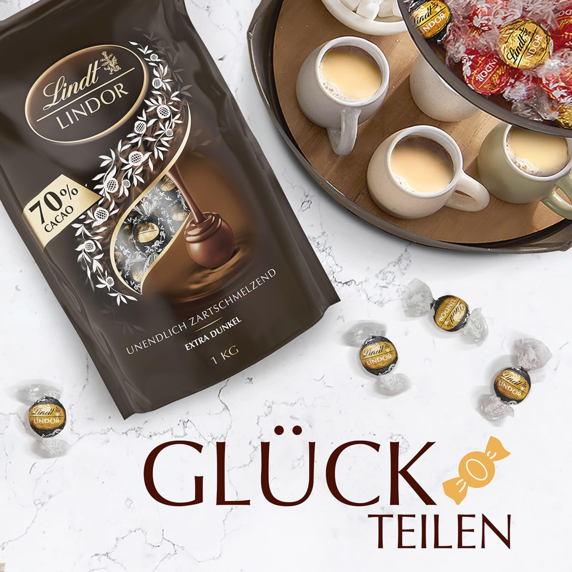 Lindt LINDOR Schokoladen Kugeln Extra Dunkel | ca. 80 Kugeln Edelbitterschokolade feinherb | dunkle Schokolade mit 70% Kakao | Großpackung, Pralinen-Geschenk | 1kg (1er Pack)